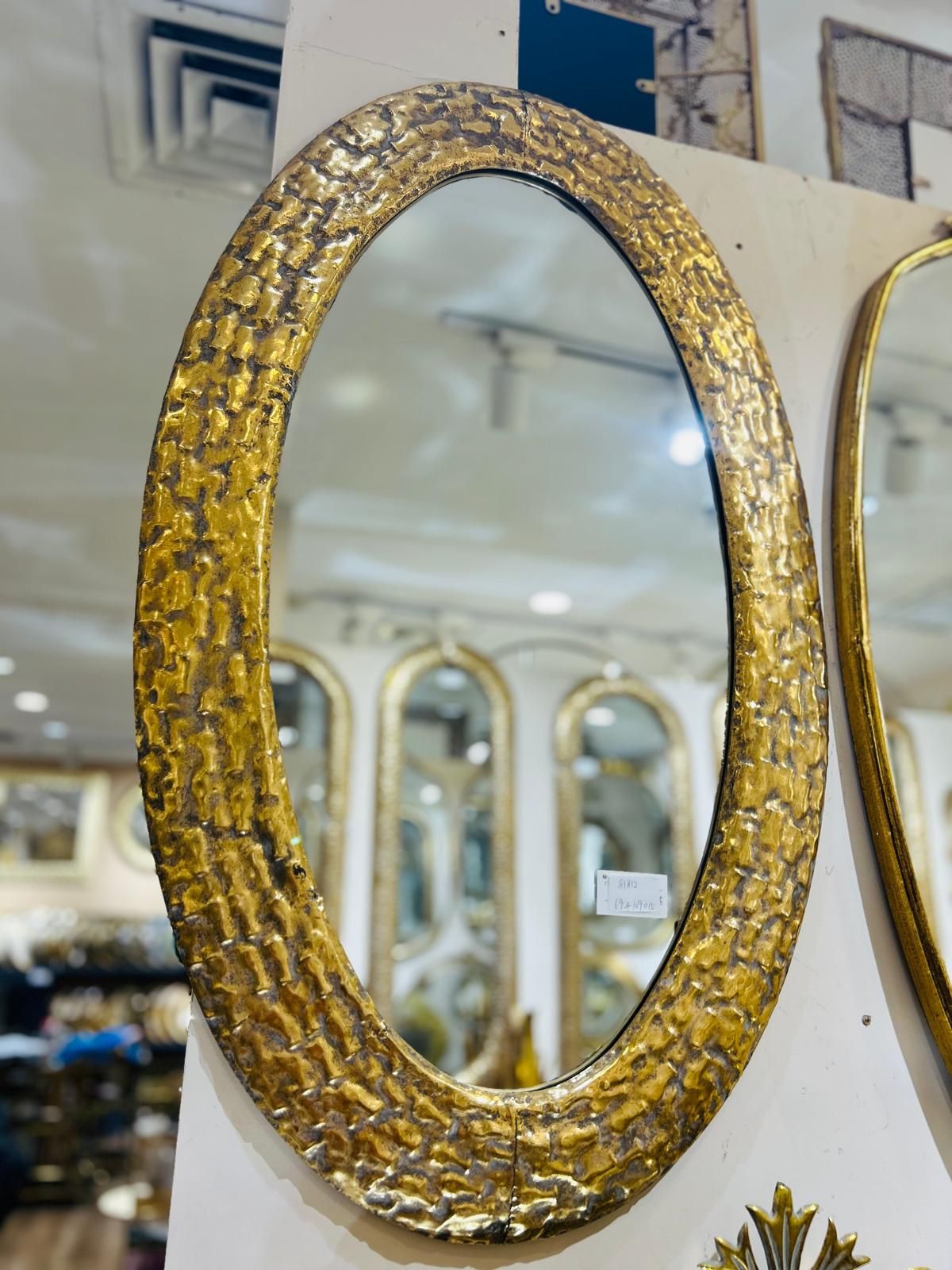 مرآة هندي بيضاوي مع اطار نحاسي